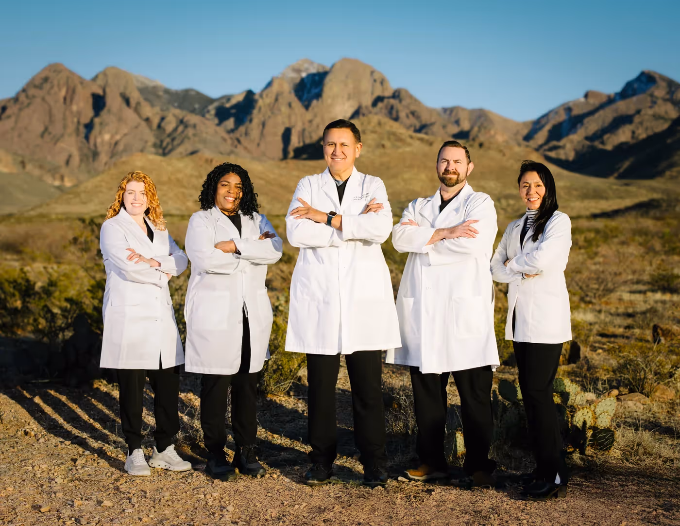Covenant clinicians in front of the Organ Mountains, Las Cruces