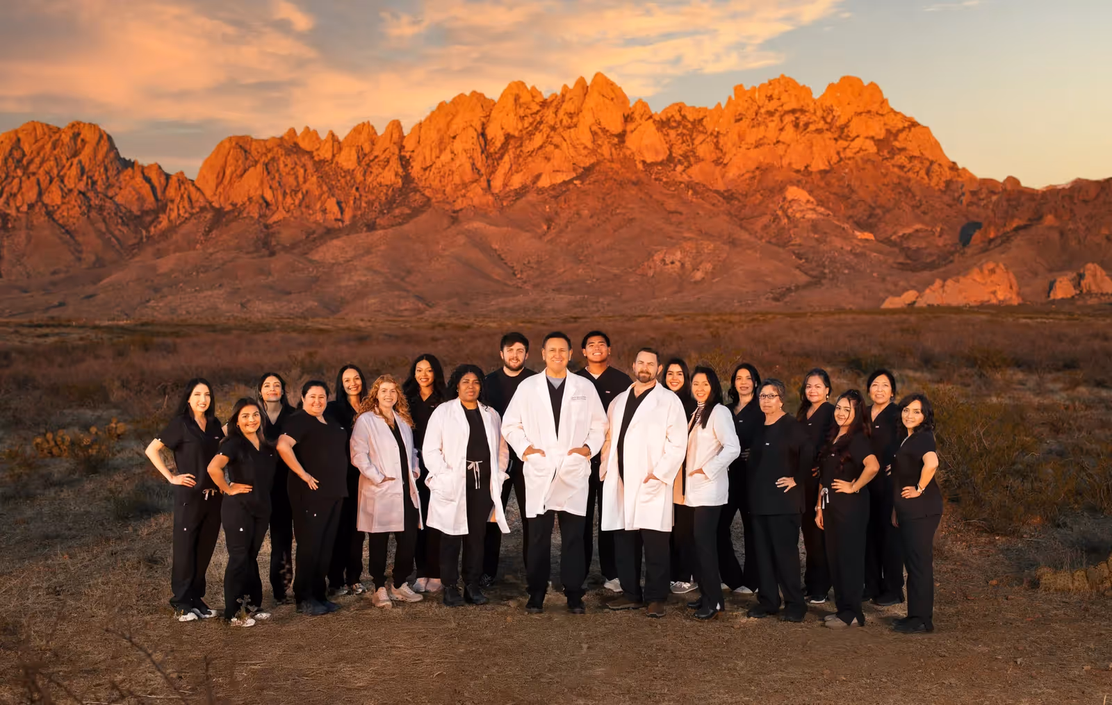 The Covenant Clinics team in front of the Organ Mountains in Las Cruces, New Mexico